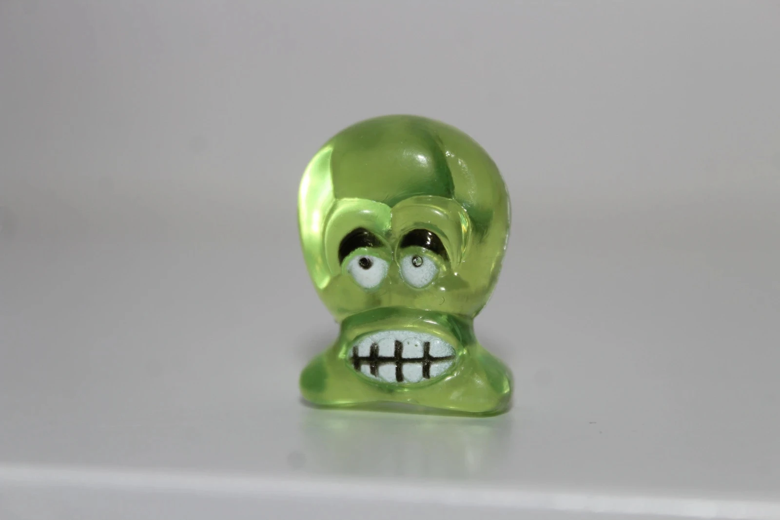 Figurine 30 vert translucide the bonehead  - Dracco Heads